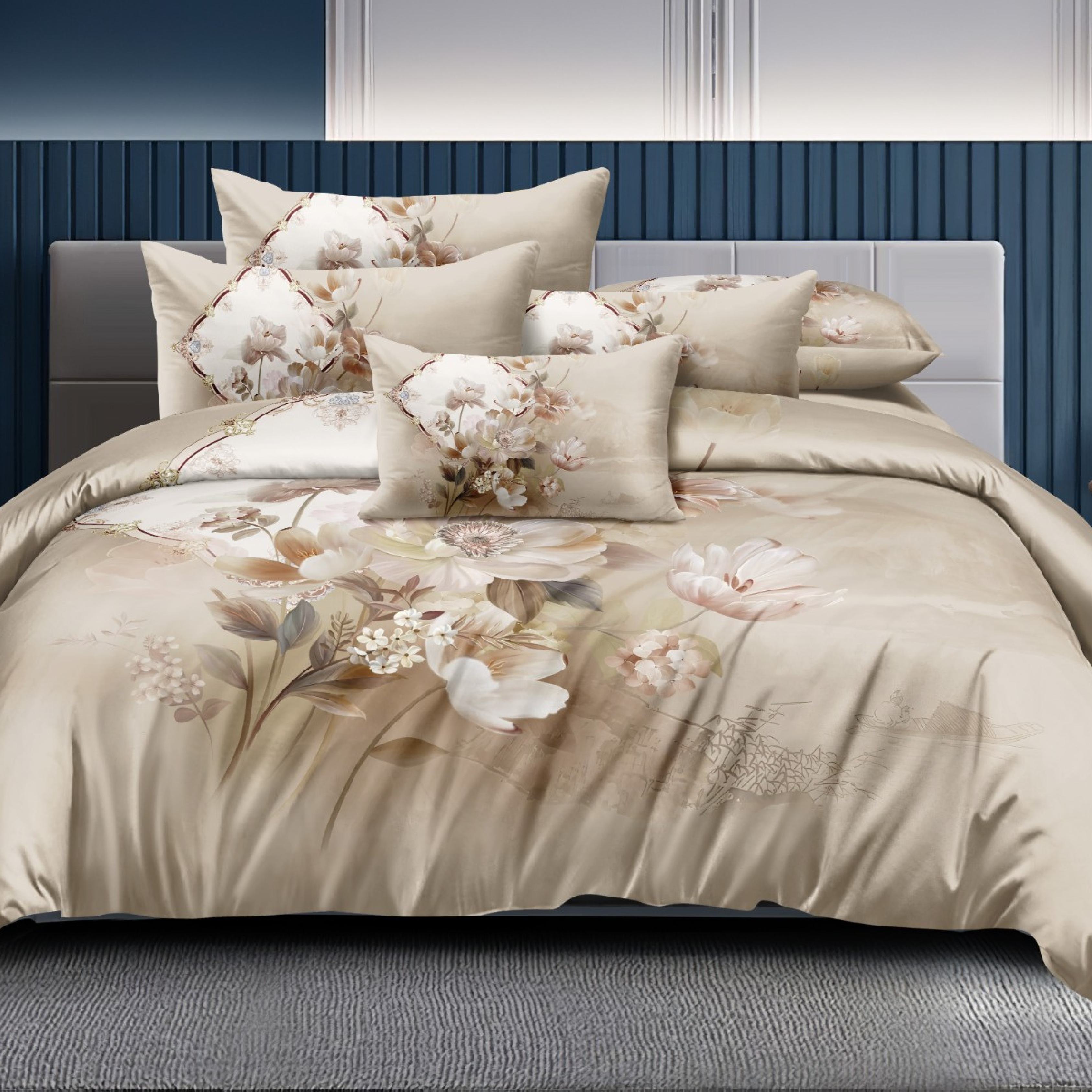 Floral patterned bedding set on a bed with a blue wall in the background