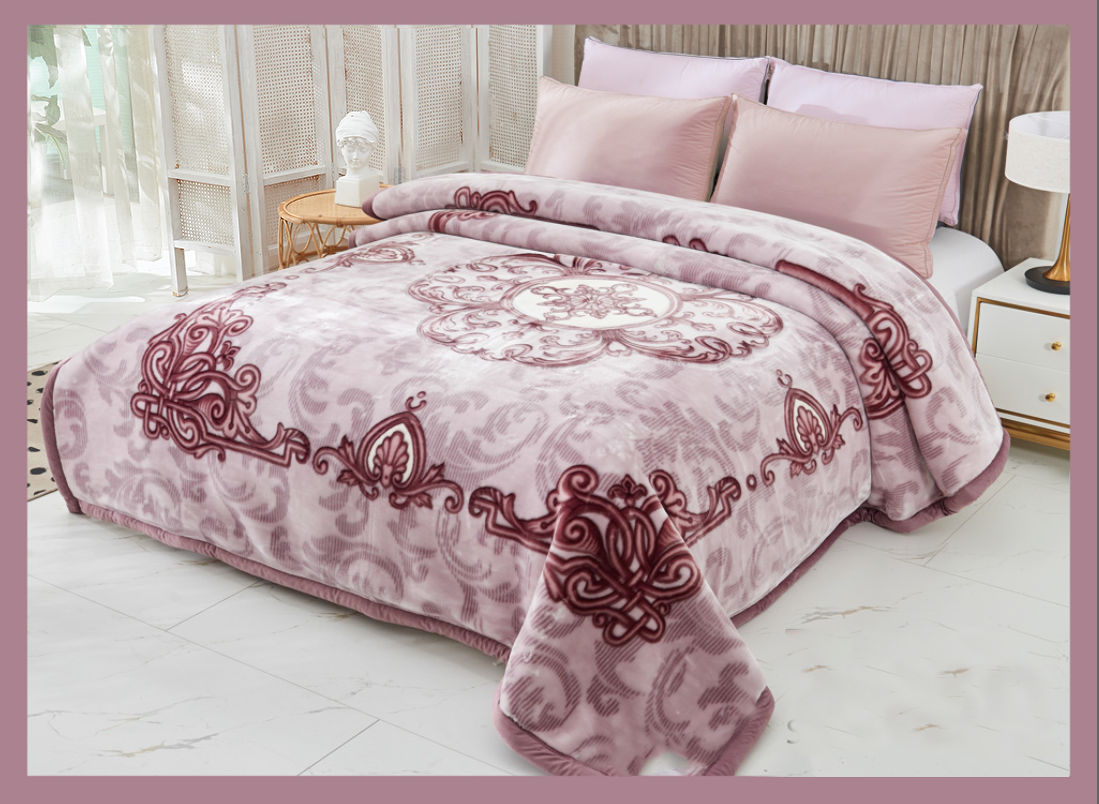 A double bed covered with a purple floral patterned blanket, with matching pillows at the head of the bed, presented as a product listing image.